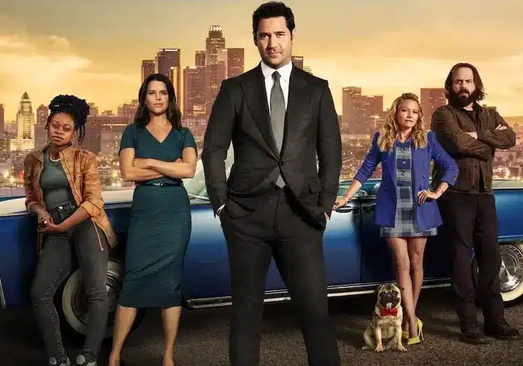 Lincoln Lawyer cast with blue Lincoln at sunset